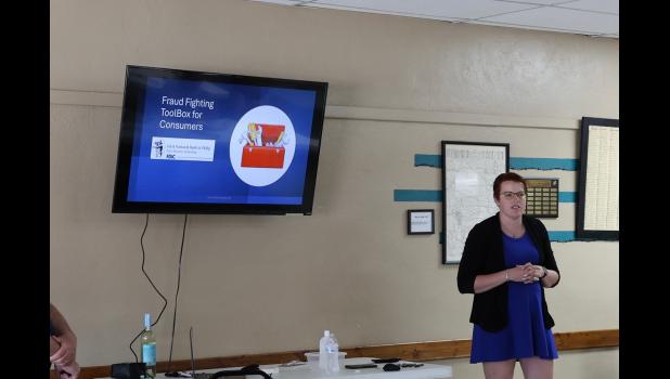 Racheal Gartner of First National Bank, welcomed the full house of attendees, and introduced the guest speaker for the Fraud Awareness Event, held July 15 in Philip.