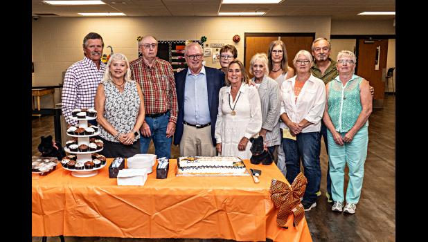 Douglas O’Dea with several classmates at his PHS Hall of Fame induction reception. (l to r): Bill Slovek, Betty Smith, _Kelly O’Connell, Douglas O’Dea, Sheryl Hansen, Trudie Formanek, Beth Smith, Carol Slovek, Sandee Heaton, Wade Baker, Shirley Sweezy. Deb Smith Photography