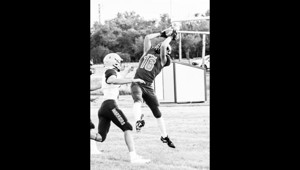 Dawson Hunt nabbed a 16 yard catch for first down and goal. Photo by Barb Hockenbary Photography