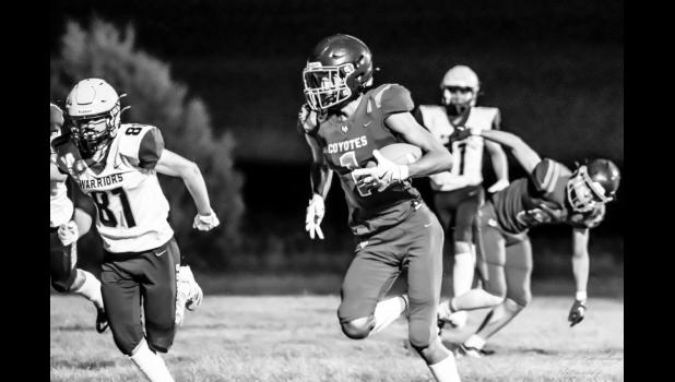 Asa Best received a 9 yard pass and ran for a touchdown. Photo by Barb Hockenbary Photography