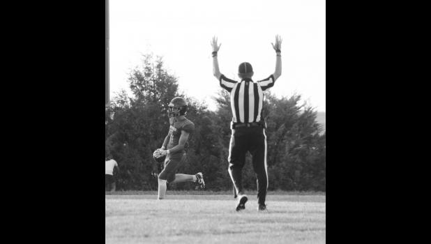 TOUCHDOWN! Thad Kierl scores the first touchdown for the evening.