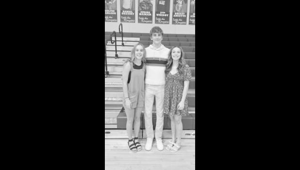 Seniors Taya Iversen, Jace Nix and Alethea Kustar have been honor band members for seven years each. Courtesy Photo