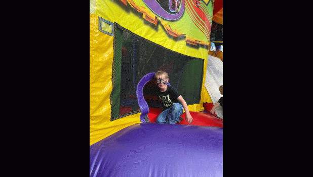 Bouncing in the park ... inflatables kept the kids entertained. Photo courtesy Lacey Wondercheck