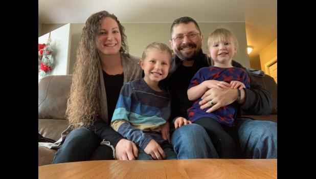 Deputy Smith with her husband, James, and two children, Jimmy and Baileigh.
