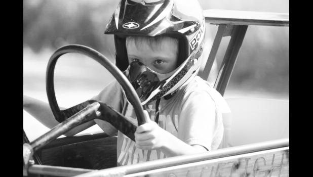 Rafe Newsam intent on getting a fast time in the boxcar race. Photo by Krisanna Thomas