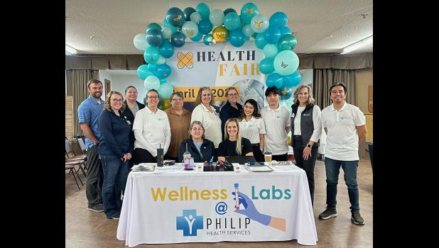 PHS employees helping to make the health fair a great success include back row, left to right, Tristan Rush, Jozelle Humble, Tiffany Lamont, Nikki Bonenberger, Cindy Pfeifle, Maureen Cadwell, Abbi McDaniel, Jessa Banaag, Huaquin Laurido, Vonda Hamill and Joverick "Karl" Tibunsay; front row, Kelly Penticoff and Ashley Slovek. Faith Flor, not pictured, was back to the hospital running lab tests throughout the day. Courtesy Photo