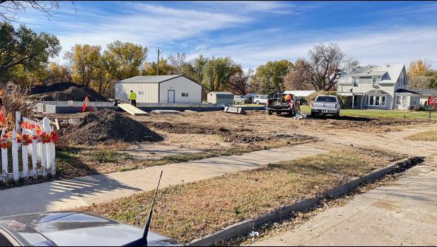 Pictures show the progression of preparing the site, moving the structure in to setting the structure on the foundation. The 6-plex is now ready for the finishing work to begin. Courtesy Photos