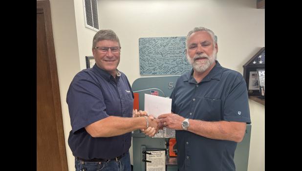 Scott Olivier (left) with Jerry Kroetch (right). Courtesy Photo