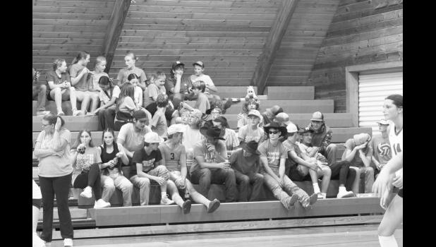 Fellow classmates come to support the game in pink. Photo by Mishayla Buchannan