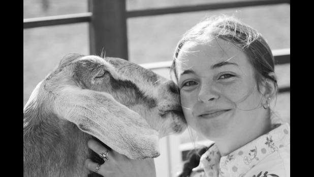 Addison Kierl and her goat, Ruth. Photo by Krisanna Thomas