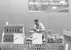 Despite being in an age category that is at higher risk for serious COVID-19 symptoms, longtime Pierre resident Don Zeller has continued to volunteer at the Feeding South Dakota distribution center during the pandemic. Nick Lowrey, South Dakota News Watch