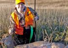 A proud young hunter shown with her harvested deer from the 2016 South Dakota Game Fish and Park Youth Hunt and Camp.