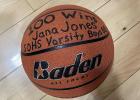 The ball the boys team presented to Coach Jones for her 100th game win.